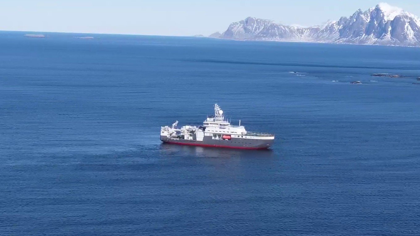 Aerial view of a working vessel in Arctic waters